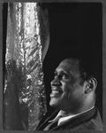 A black-and-white photograph of Paul Robeson