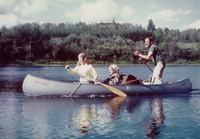 John McPhee poling a canoe with his daughters Jenny (in the bow) and Martha (in the middle) in Ontario in 1978.
