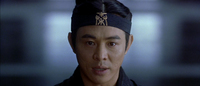 man wearing a head band that says 'Qin'