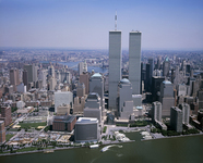 The twin towers soared over Lower Manhattan and the East River behind them.