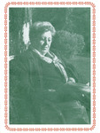 Flynn in her later years, sitting outside in a garden. She is dressed casually in a warm coat. She looks down at her book or paper, wearing spectacles. Simple border like a long vine.