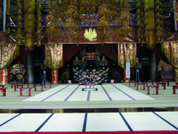 Fig. 7. A photograph of the altar and main ritual space. There are several brocaded curtains in the back and foreground.