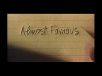 A close-up of handwritten English title, _Almost Famous_, on yellow, lined paper.