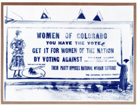 Suffragist holding a long pasting broom smiles at the viewer as she finishes posting a large billboard protesting Democrats opposed to the 19th Amendment.