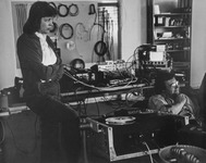 Artists in a studio, Steina and Woody Vasulka in front of media equipment