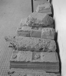 Photograph of the Temple of Castor and Pollux at Cora: fragments of soffit featuring coffers.