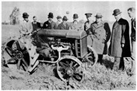 Henry Ford, Lord Northcliffe (second and third from right) and the Northcliffe mission with a Fordson tractor. Dearborn, October, 1917.