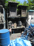 Photograph of numerous prop statues and shrines.