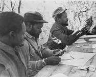 Fig. 16. Photograph of Frelimo military leaders analyzing the headshots of unidentified individuals.