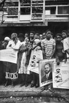 Fig. 50. Photograph by José Cabral of the people who lined Maputo’s streets to watch the funerial procession of Mozambique’s president Samora Machel after his death in a suspicious plane crash. People hold posters, which included Machel’s official portrait.