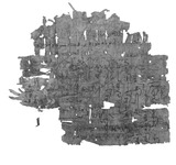 Fragment of a papyrus containing Arabic texts written over each other.