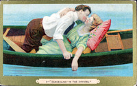 A photographic postcard of a couple "canoedling."