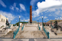 Photograph depicting the Plaza del Quinto Centenario with the sculpture El Totem in the center of the photograph. The picture was taken by Danita Delimont. Copyright Alamy Stock Photo.