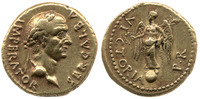 Photograph of an aureus of Galba. Reverse: Victoria standing on a globe and holding a wreath and a palm.