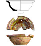 Photograph of slip-painted vessel parts put together in complete shape.
