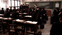 calligraphy on the wall in a classroom